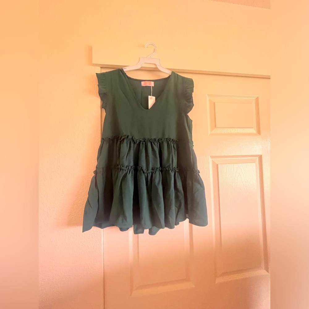 greenish blue blouse. i have a extra large and a small.